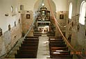 Luboml, 1997 r. Wnętrze częściowo odnowionego kościoła parafialnego pw. św. Trójcy.