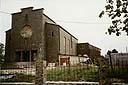 Sarny, 1997 r. Kościół pw. Przemienienia Pańskiego z lat 1935-1939, w remoncie po zniszczeniach dokonanych wskutek wykorzystywania budynku po wojnie jako magazynu i hurtowni.
